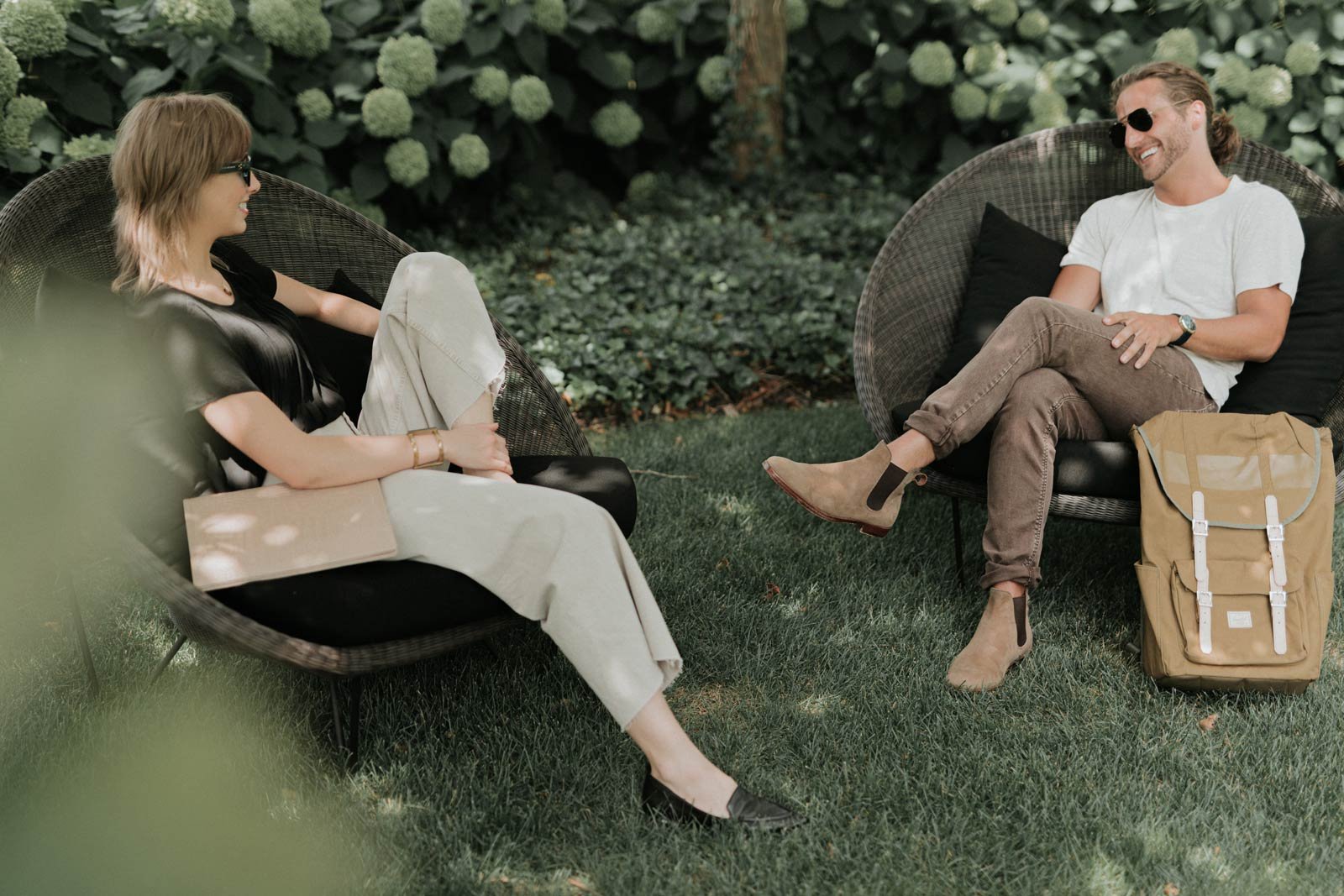 two people sitting outside at work