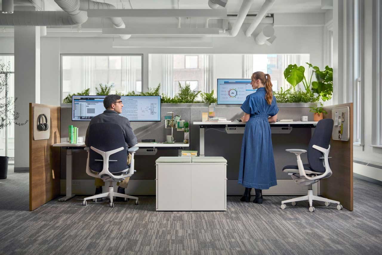 Office with desk diveders for privacy